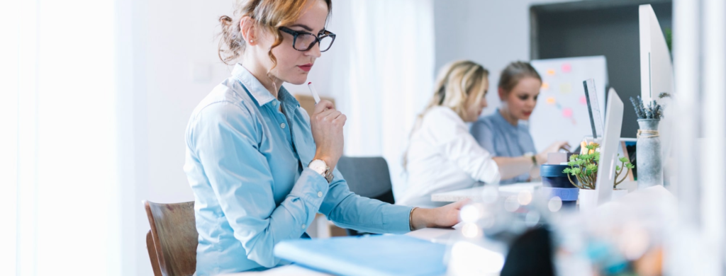 confident young businesswoman working laptop office min jpg